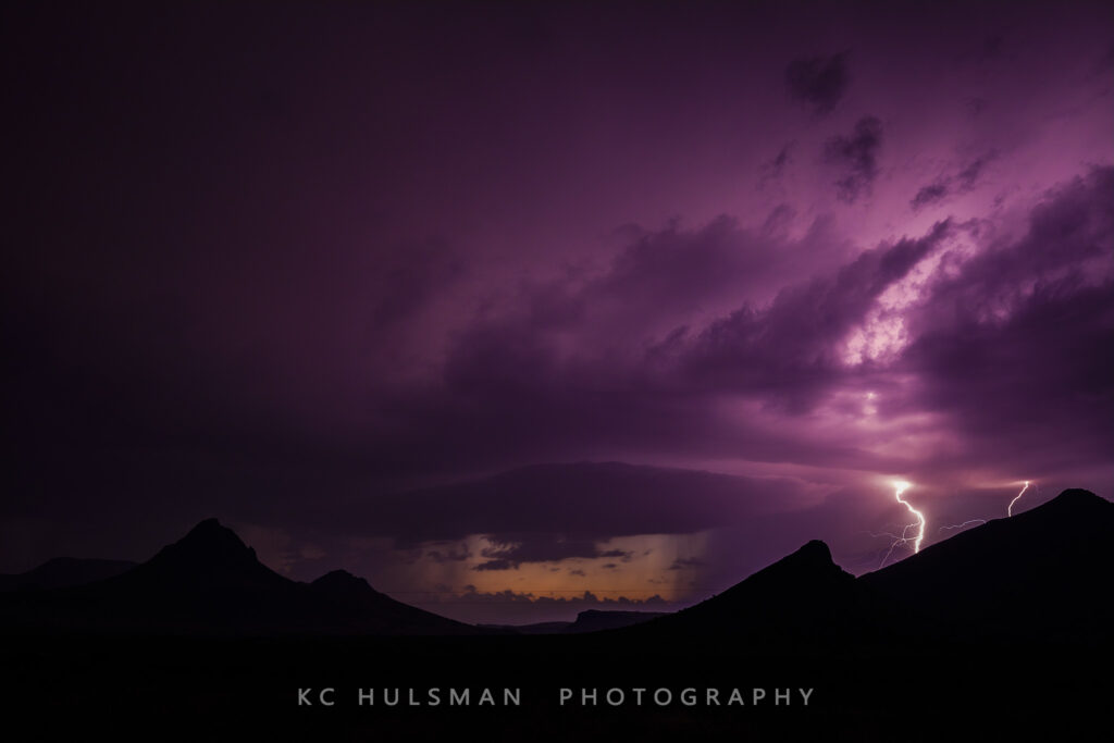 Photo by KC Hulsman of lightning on the road between Marfa and Alpine, Texas 